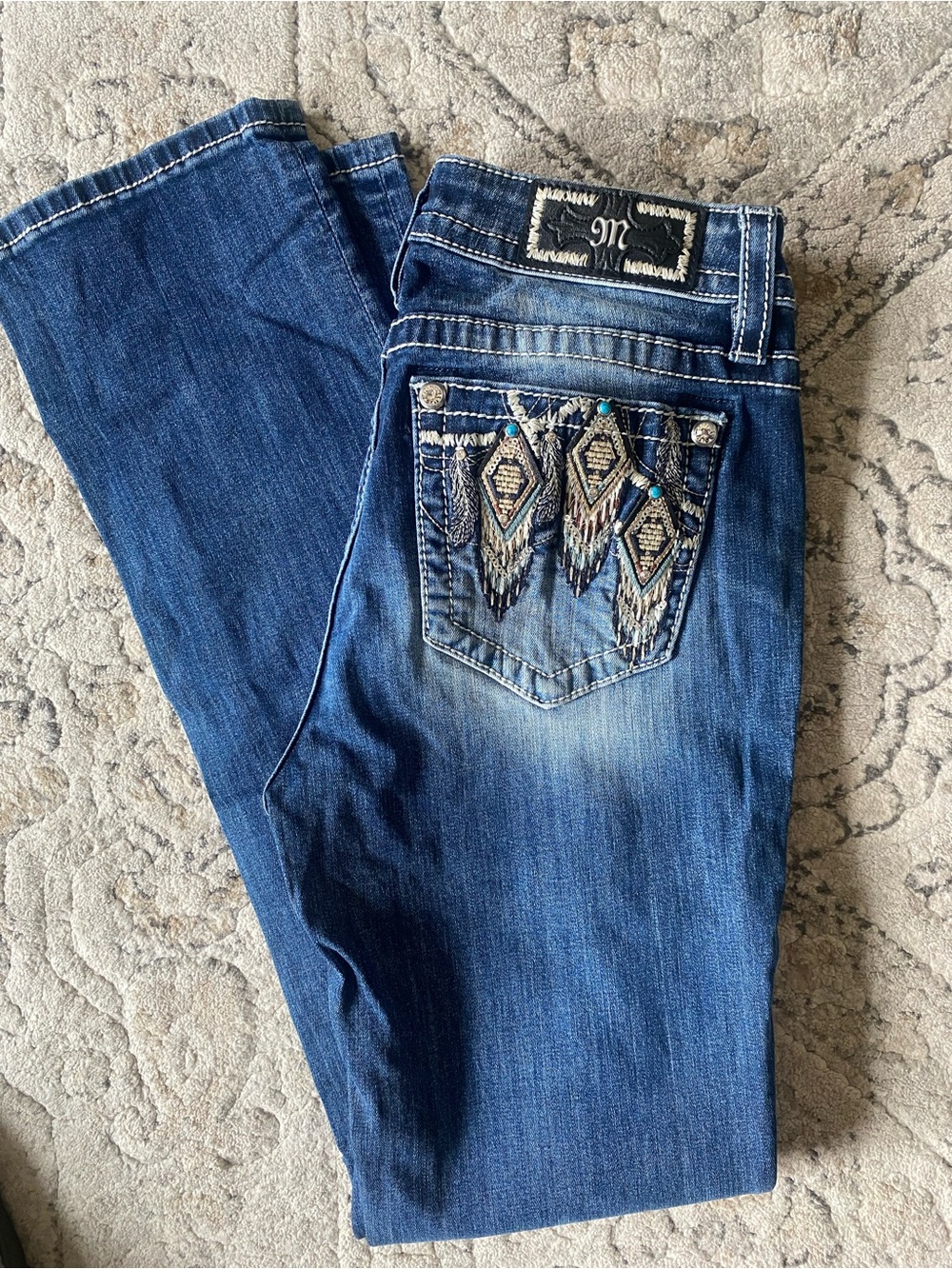 Miss Me Mid Rise Straight Jeans with Embroidered Pocket. Inseam 33. Size 28.